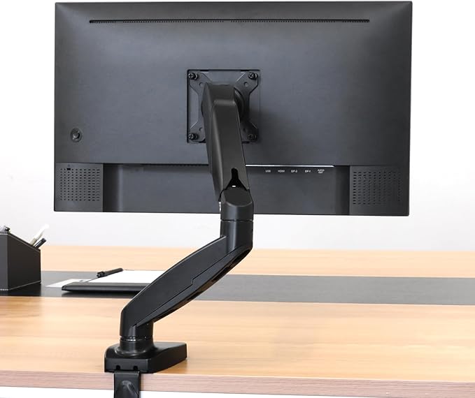 Amazon Basics Gas Spring Single Computer Monitor Arm Desk Mount, Adjustable, Holds up to 27" Monitors, Black