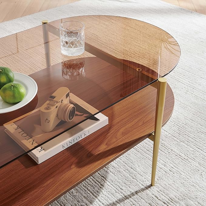 X-Large Oval Glass Coffee Table, Mid-Century Modern Design, L47 x W24 x H17 inch, for Living Room, Amber Glass Top and Walnut Finish Wood Shelf, Conical Legs with Gold Finish Frame