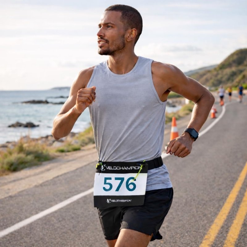 VeloChampion Lightweight Running Belt Waist Pack for Men Women - Elasticated Stretch Fit Race Number Holder - No Pins - 3 Sizes - Run. Triathlon. Cycle. Marathon. Jogging (1, X-Small)