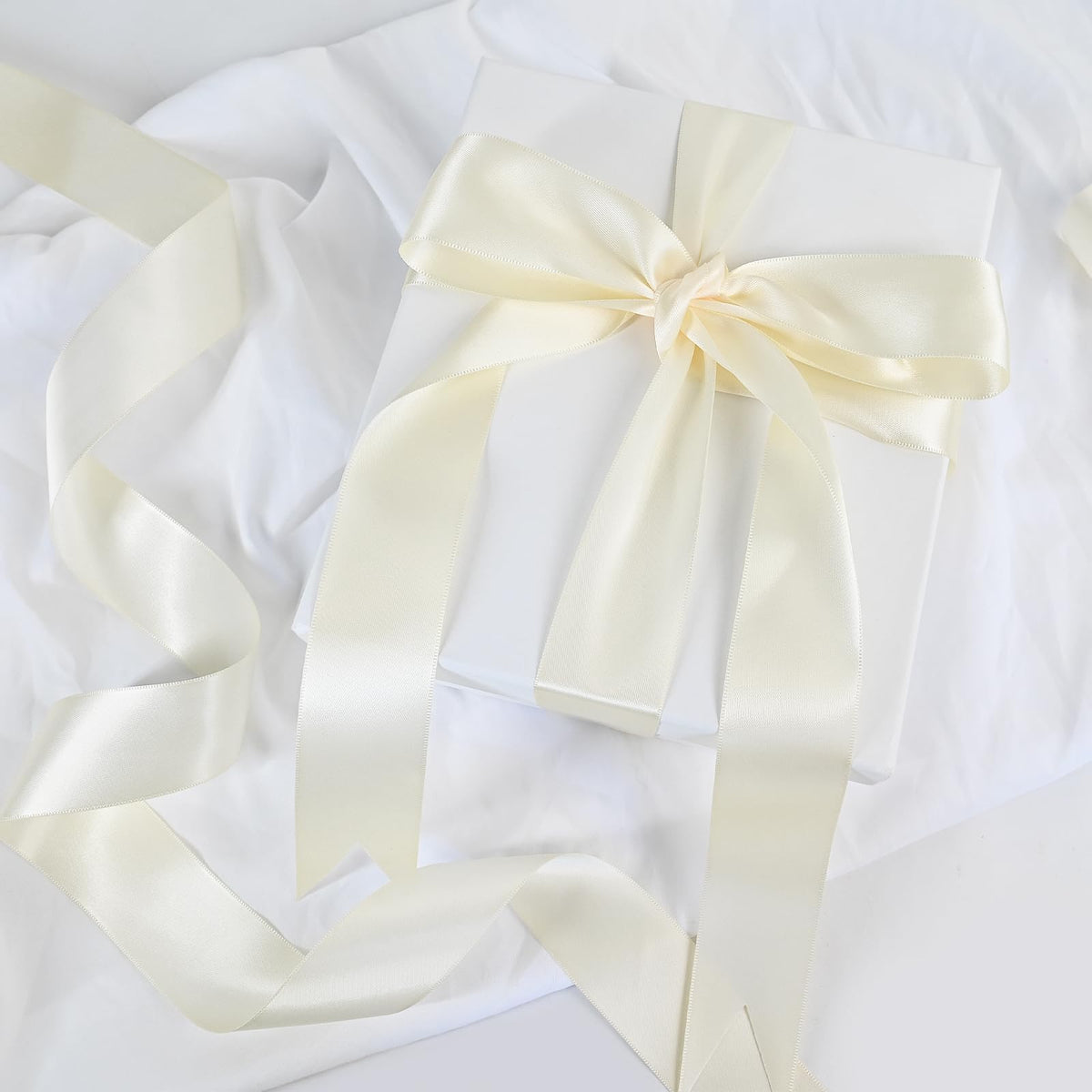LEEQE Double Face Continuous Ivory Satin Ribbon 1-1/2 Inch x 50 Yards Polyester Ivory Ribbon for Gift Wrapping Weddings Party Hair Bows Invitations Decorations and More