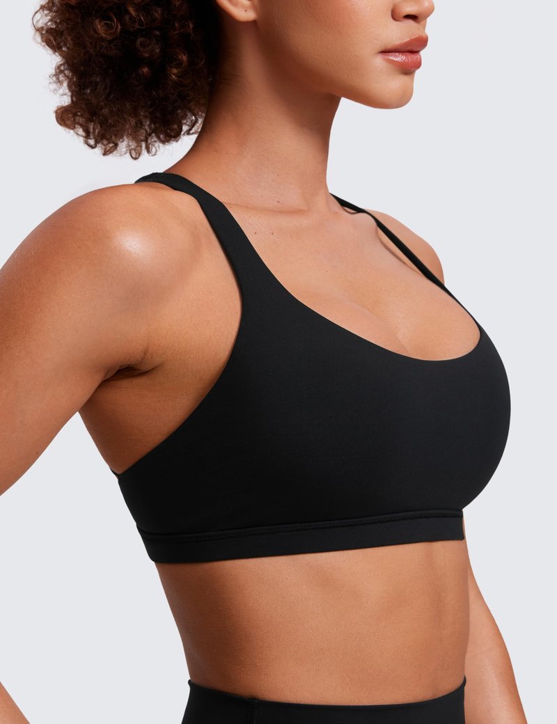 CRZ YOGA Naked Feeling Strappy Sports Bras for Women - Criss Cross Back Wireless Padded Cami Yoga Workout Top Black Medium