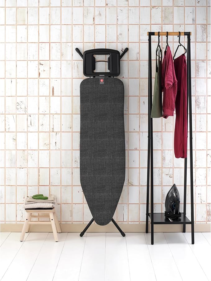 Brabantia - Ironing Board B – Solid Steam Iron Rest – Adjustable Height – Non-Slip Rubber Feet – 100% Fairtrade Cotton Cover with Foam Padding – Foldable – Denim Black – Size B (49 x 15 in)